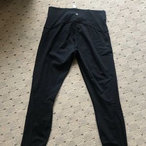 Cropped lululemon leggings with mesh at the bottom
